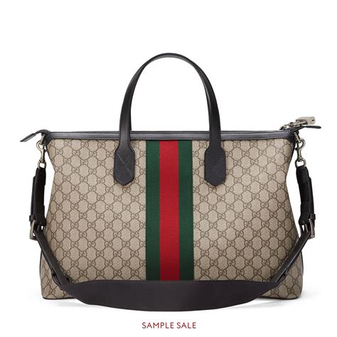 GUCCI: Gucci borsa da viaggio in tessuto GG 